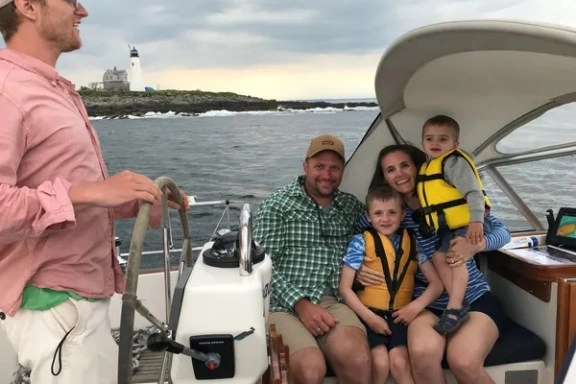 famaily on boat